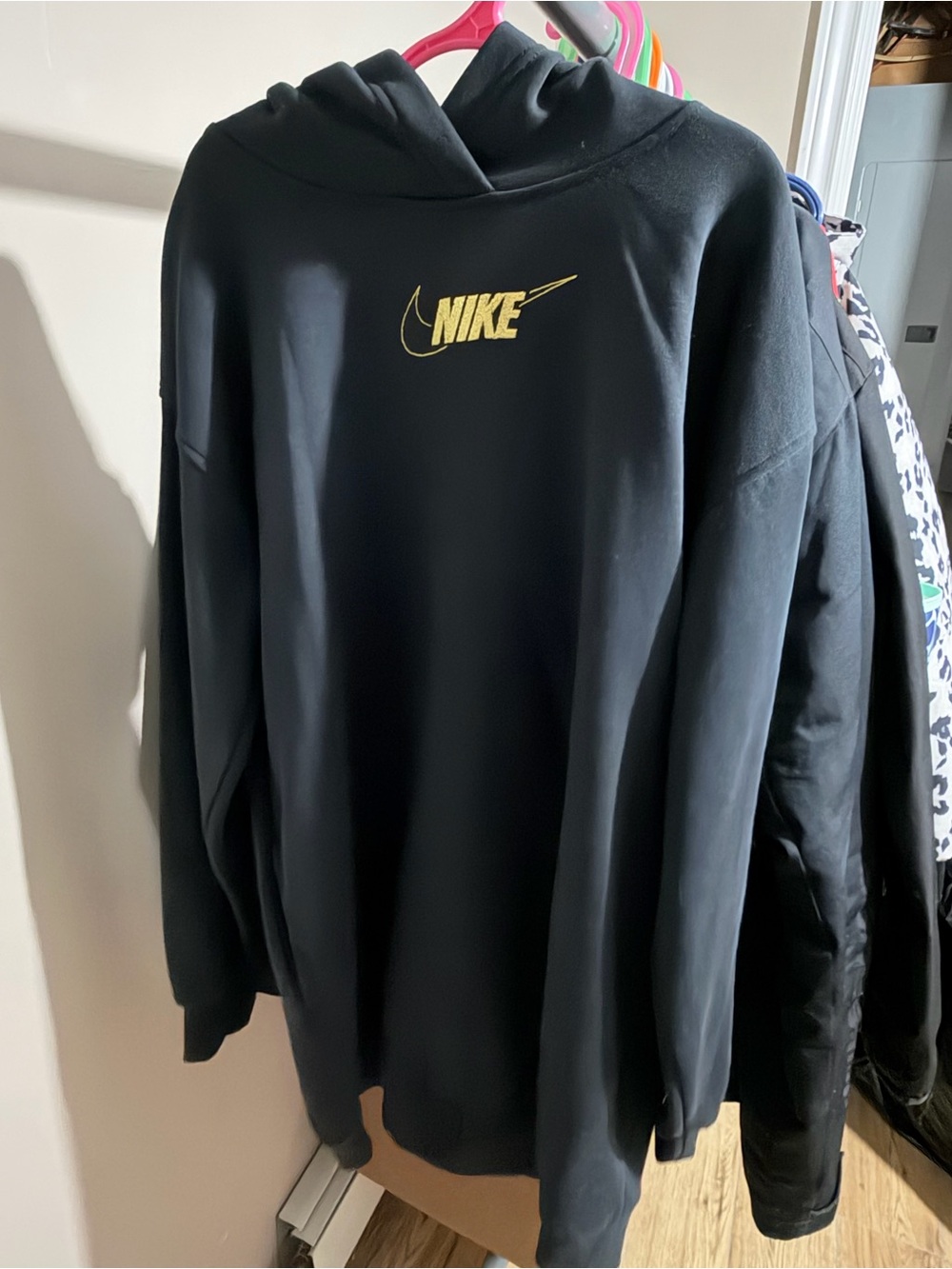 Never worn Nike Black Hoodie with Gold Logo